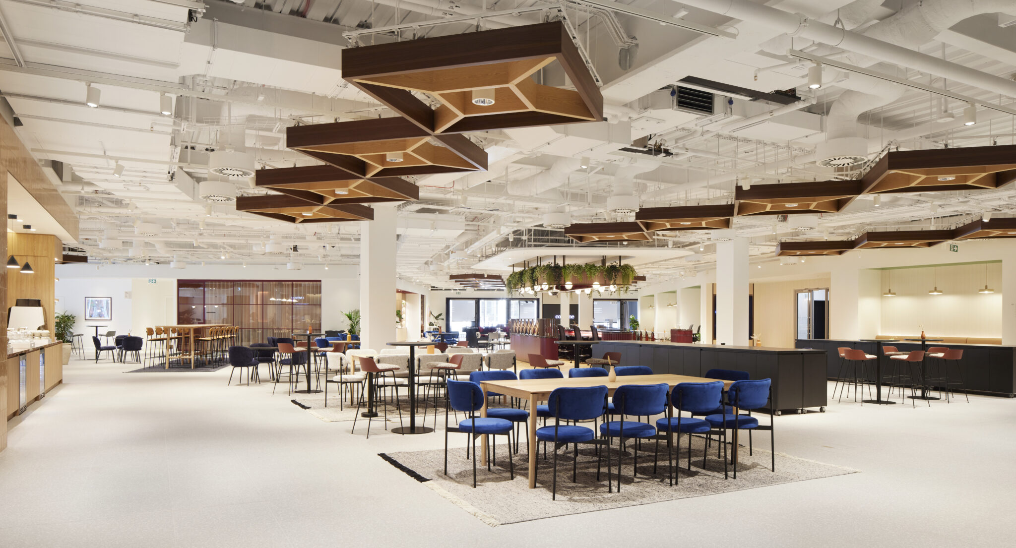 Empty office space with tables and chairs