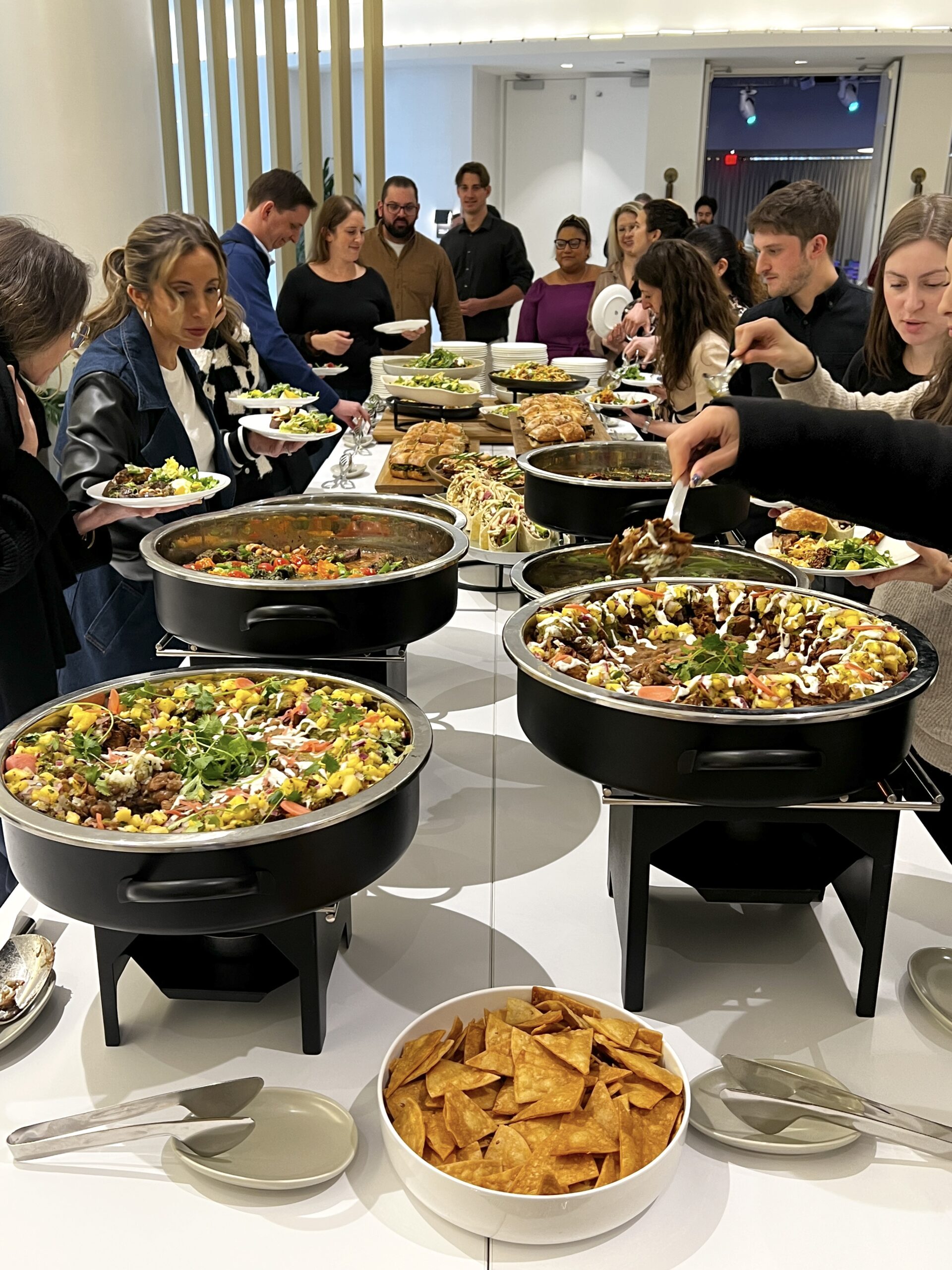 People getting food from buffet