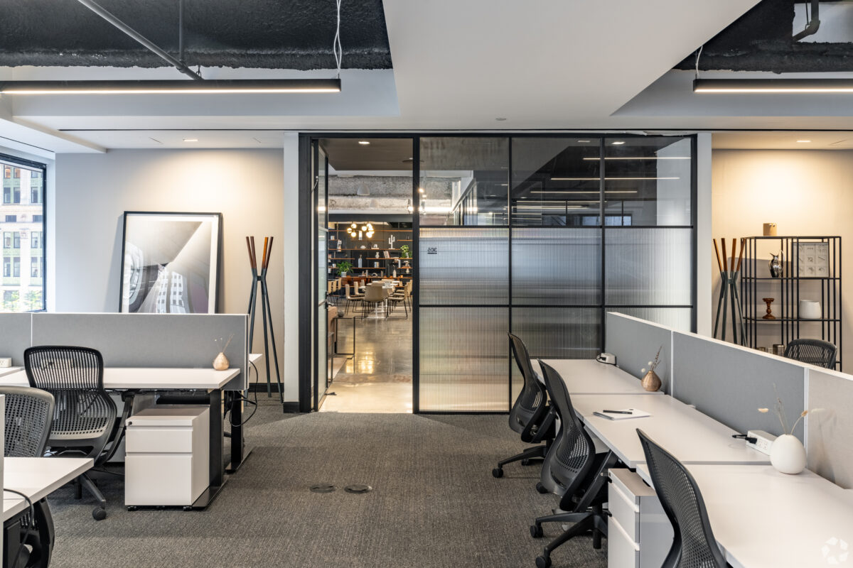 Empty office space with line of desks
